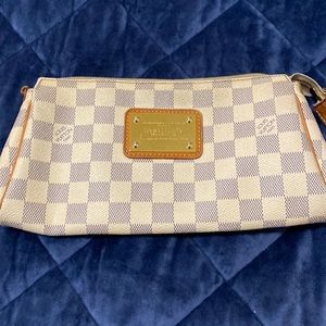 Louis Vuitton  bag small.  It is good condition.